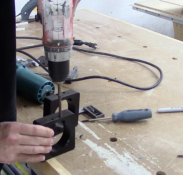 Spindle mount — Square clamps to the mounting bracket and drill holes.