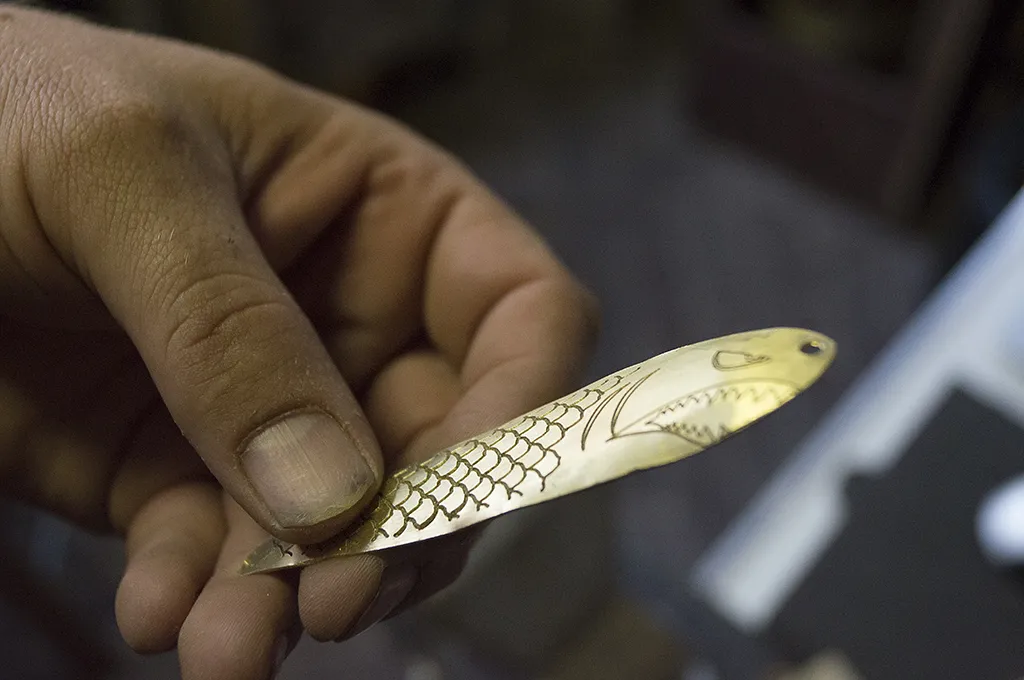 Brass fishing lure — using the mold to shape the brass