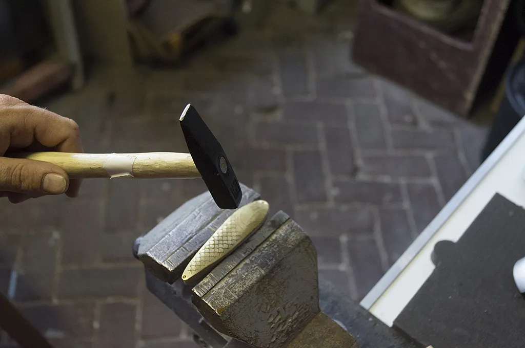 Brass fishing lure — using the mold to shape the brass (image 2)