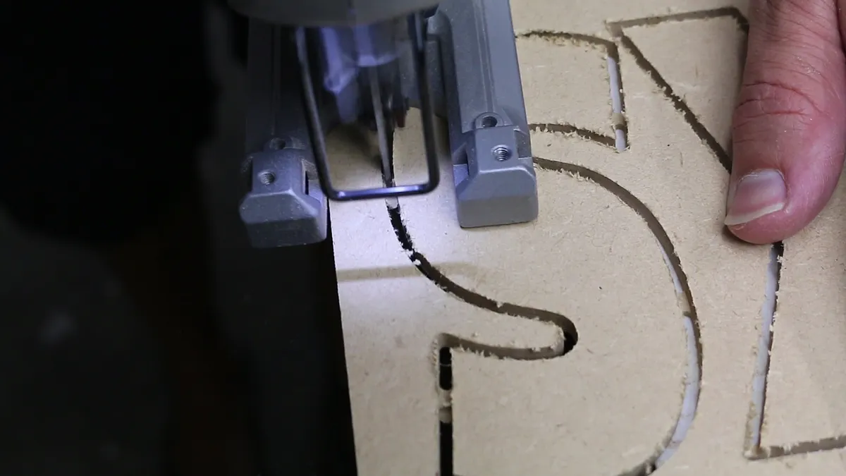 Wine Cork Holder — Cut tab around the letters