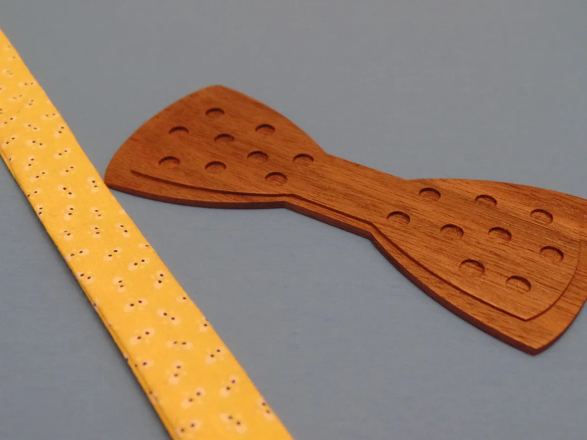 Simple engraved bow tie — Add a fabric center tie