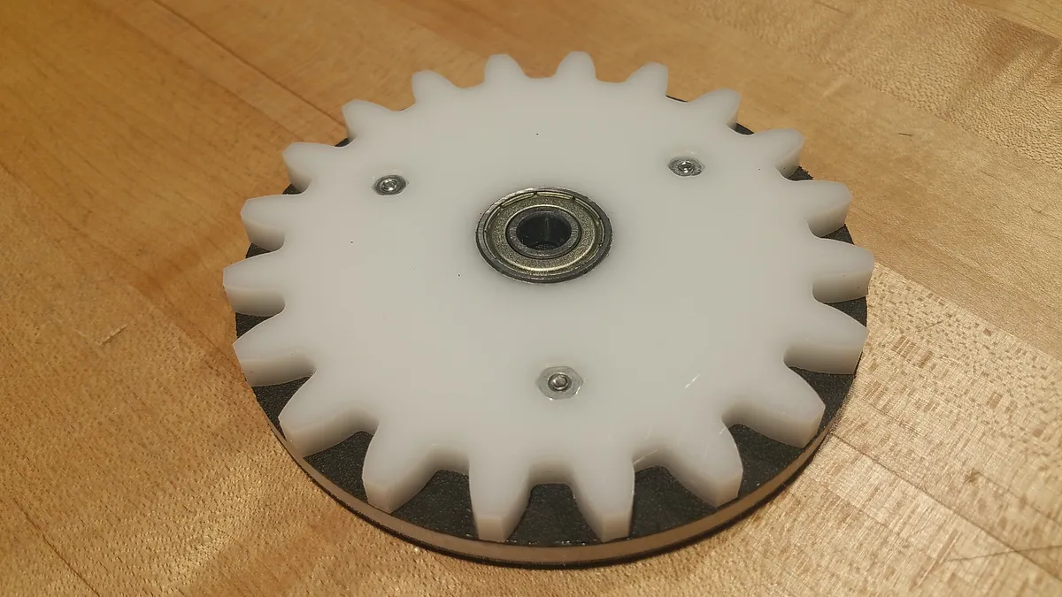 The "BoJimble" 7-Gear Table Toy — Attach Small Gears to Medallions
