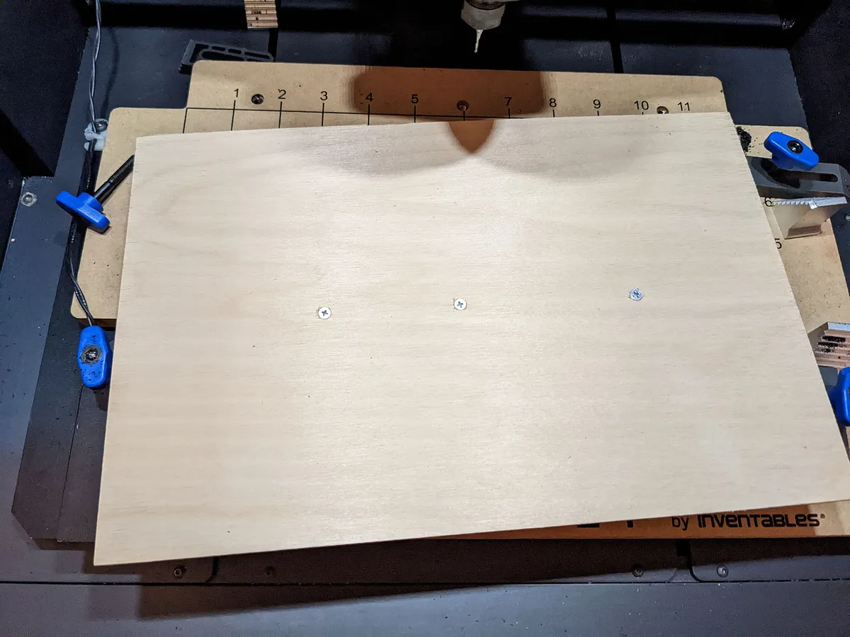 Aerodynamic Pinewood Derby Car — Screw the pinewood derby block onto the plywood