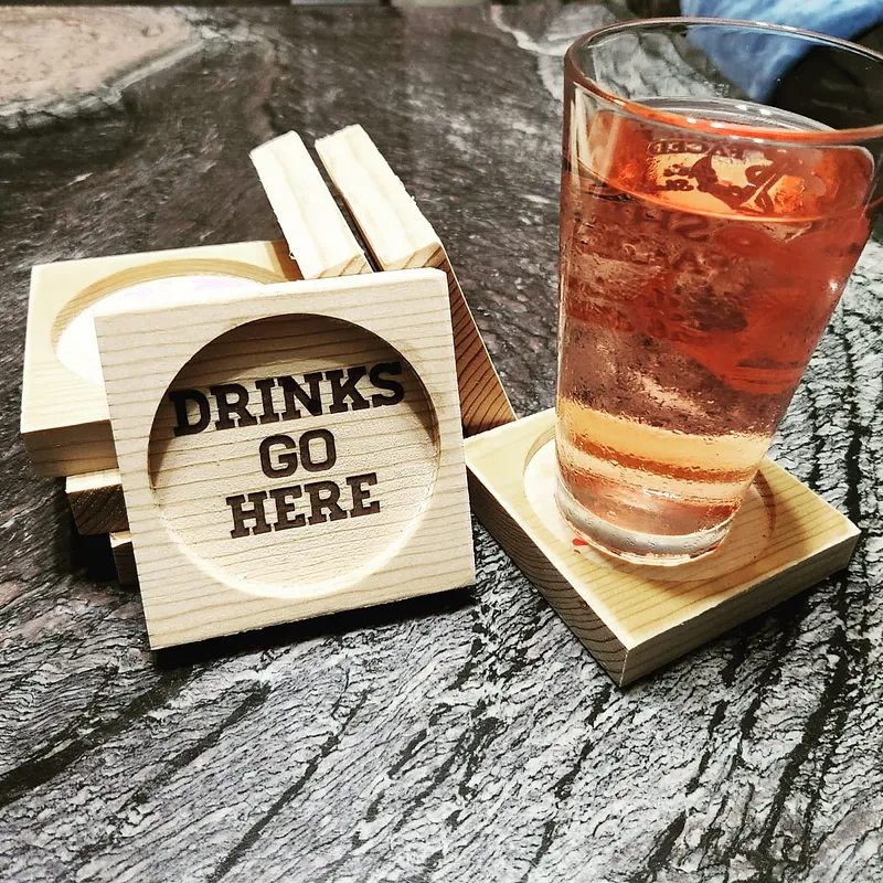 "Drinks Go Here" Wooden Coasters - image 1