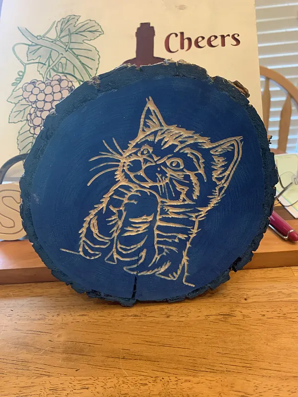 Kitty carved on Log - image 2
