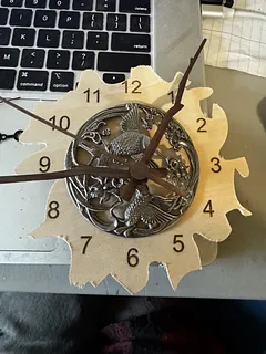 bird clock with metal inlay
